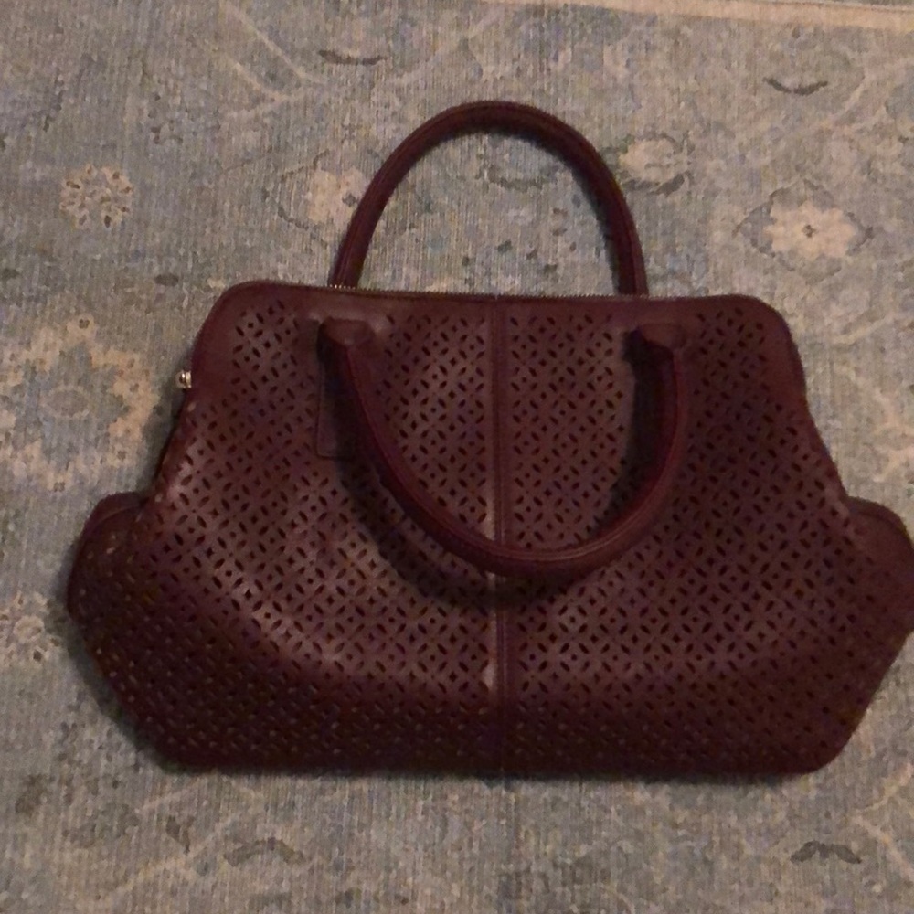 Maroon leather handbag. Unknown brand.